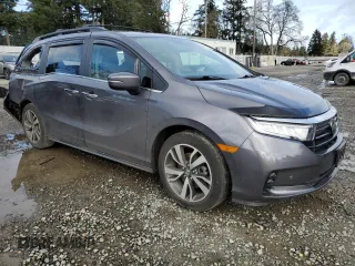 2021 Honda Odyssey Touring with VIN 5FNRL6H87MB033970, listed as a Copart auction lot 48928895 with 52,287 mi miles and Salvage Title. Bid and sale history available at carsss.com. Image 4.