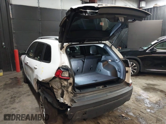 2019 Jeep Cherokee Latitude Plus with VIN 1C4PJMLX4KD232091, listed as a IAAI auction lot 41524058 with 59,196 mi miles and . Bid and sale history available at DreamBid. Image 3.
