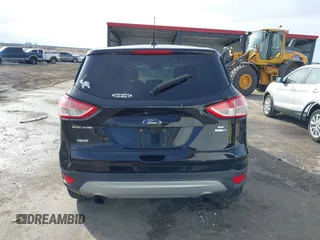 2016 Ford Escape SE with VIN 1FMCU9G90GUB25458, listed as a IAAI auction lot 41643349 with 158,439 mi miles and . Bid and sale history available at DreamBid. Image 17.