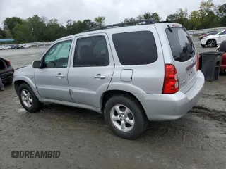2006 Mazda Tribute i with VIN 4F2YZ02Z26KM14821, listed as a Copart auction lot 71718434 with 318,841 mi miles and Salvage Title. Bid and sale history available at carsss.com. Image 2.