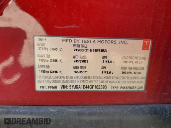 2016 Tesla Model S 90D with VIN 5YJSA1E44GF162393, listed as a Copart auction lot 51708825 with 173,880 mi miles and Salvage title. Bid and sale history available at DreamBid. Image 13.