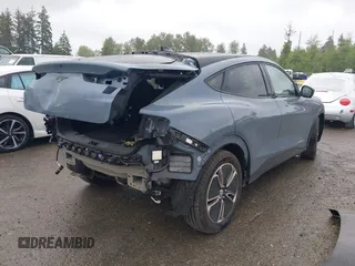 2023 Ford Mustang Mach-E Premium z VIN 3FMTK3S51PMA84141, wystawiony jako IAAI lot #42375252 z przebiegiem 14 370 mil mil oraz . Historia ofert i sprzedaży dostępna na DreamBid. Obrazek 4.