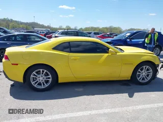 2015 Chevrolet Camaro LS z VIN 2G1FB1E36F9249133, wystawiony jako IAAI lot #42026600 z przebiegiem 63 300 mil mil oraz . Historia ofert i sprzedaży dostępna na DreamBid. Obrazek 14.