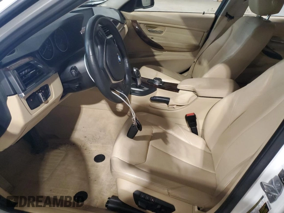 2014 BMW 3 Series 328i xDrive with VIN WBA3B5G56ENS11491, listed as a Copart auction lot 59555895 with 87,588 mi miles and Salvage title. Bid and sale history available at DreamBid. Image 7.