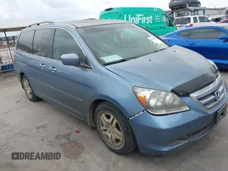 2007 Honda Odyssey EX-L with VIN 5FNRL38717B127157, listed as a IAAI auction lot 41890838 with 195,241 mi miles and . Bid and sale history available at DreamBid. Image 1.