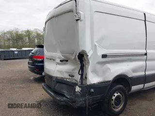 2017 Ford Transit with VIN 1FTYR2CM6HKB25023, listed as a IAAI auction lot 42071625 with 146,965 mi miles and . Bid and sale history available at DreamBid. Image 6.