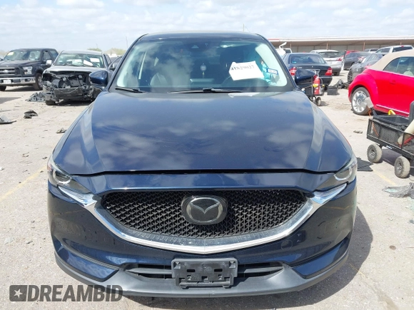 2018 Mazda CX-5 Touring with VIN JM3KFACM3J1370129, listed as a IAAI auction lot 41829027 with 71,305 mi miles. Bid and sale history available at carsss.com. Image 12.