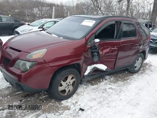 2002 Pontiac Aztek z VIN 3G7DA03E72S599401, wystawiony jako IAAI lot #41248586 z przebiegiem 135 971 mil mil oraz . Historia ofert i sprzedaży dostępna na DreamBid. Obrazek 2.