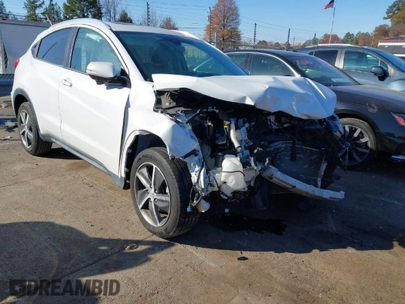 2021 Honda HR-V EX with VIN 3CZRU6H5XMM750887, listed as a IAAI auction lot 40983288 with 56,482 mi miles. Bid and sale history available at carsss.com. Image 1.