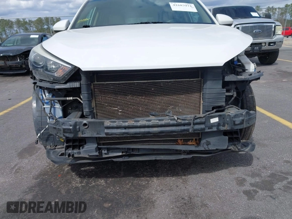 2017 Hyundai Tucson SE with VIN KM8J3CA44HU511581, listed as a IAAI auction lot 41687971 with 111,981 mi miles. Bid and sale history available at carsss.com. Image 6.