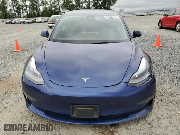 2023 Tesla Model 3 with VIN 5YJ3E1EA7PF450973, listed as a Copart auction lot 61082175 with 47,029 mi miles and Salvage title. Bid and sale history available at DreamBid. Image 5.