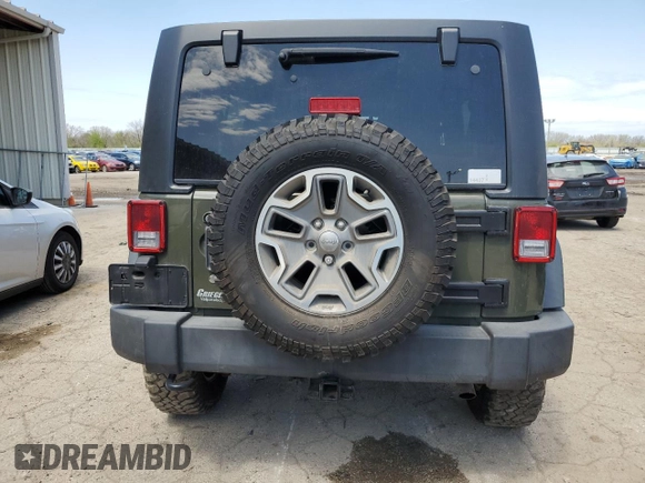 2015 Jeep Wrangler Unlimited Rubicon with VIN 1C4BJWFGXFL752602, listed as a Copart auction lot 54102395 with 26,466 mi miles and Salvage title. Bid and sale history available at DreamBid. Image 6.