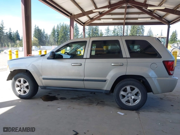 2008 Jeep Grand Cherokee Laredo with VIN 1J8GR48K18C222454, listed as a IAAI auction lot 42047541 with 180,145 mi miles. Bid and sale history available at carsss.com. Image 15.