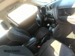 2010 Jeep Patriot Sport with VIN 1J4NT2GBXAD525538, listed as a IAAI auction lot 42178852 with 213,350 mi miles. Bid and sale history available at carsss.com. Image 5.