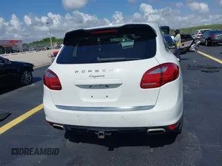 2014 Porsche Cayenne with VIN WP1AA2A20ELA02638, listed as a IAAI auction lot 42349570 with 113,355 mi miles and . Bid and sale history available at DreamBid. Image 16.