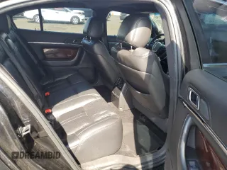 2013 Lincoln MKS z VIN 1LNHL9EK2DG615733, wystawiony jako Copart lot #68223794 z przebiegiem 402 495 mil mil oraz Szkoda całkowita • Salvage title. Historia ofert i sprzedaży dostępna na DreamBid. Obrazek 10.