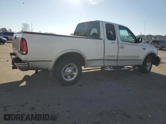 2000 Ford F-150 XL with VIN 1FTRX17L1YNA26050, listed as a Copart auction lot 43597105 with 205,152 mi miles and Salvage Title. Bid and sale history available at carsss.com. Image 3.