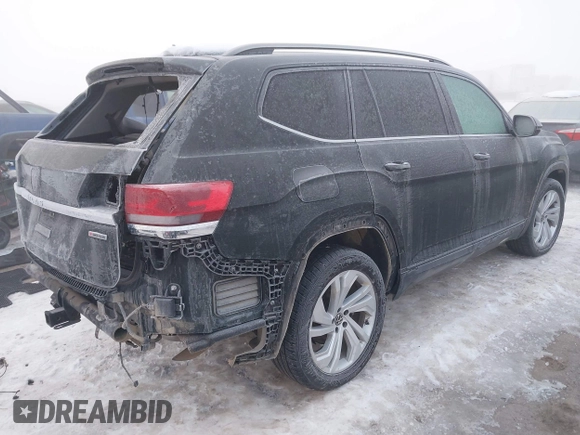 2021 Volkswagen Atlas SE with VIN 1V2HR2CA9MC574558, listed as a IAAI auction lot 41296583 with 50,267 mi miles and . Bid and sale history available at DreamBid. Image 4.