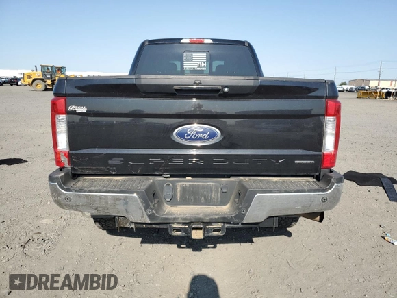 2017 Ford F-250 Lariat with VIN 1FT7W2B6XHEE59786, listed as a Copart auction lot 59812305 with 67,630 mi miles and Salvage title. Bid and sale history available at DreamBid. Image 6.