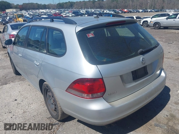 2011 Volkswagen Jetta SportWagen S with VIN 3VWKX7AJ0BM658659, listed as a IAAI auction lot 41835369 with 195,501 mi miles. Bid and sale history available at carsss.com. Image 3.