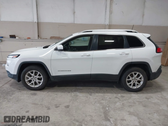 2016 Jeep Cherokee Latitude with VIN 1C4PJMCS5GW341286, listed as a IAAI auction lot 40723940 with 113,040 mi miles and . Bid and sale history available at DreamBid. Image 14.