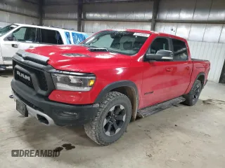 2019 Ram 1500 Rebel with VIN 1C6SRFLT7KN878464, listed as a Copart auction lot 57230985 with 140,776 mi miles and Salvage title. Bid and sale history available at DreamBid. Image 1.