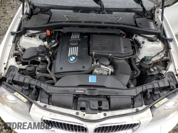 2008 BMW 1 Series 135i z VIN WBAUN935X8VK39744, wystawiony jako Copart lot #87072544 z przebiegiem 40 581 mil mil oraz Szkoda całkowita • Salvage title. Historia ofert i sprzedaży dostępna na DreamBid. Obrazek 11.