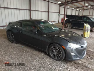 2014 Scion FR-S with VIN JF1ZNAA14E8702486, listed as a IAAI auction lot 41715636 with 160,433 mi miles and . Bid and sale history available at DreamBid. Image 1.