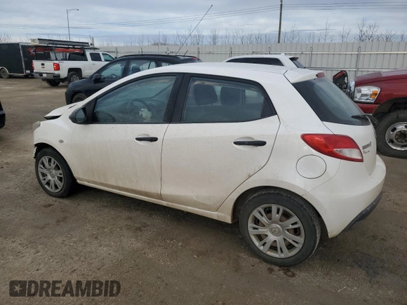 2012 Mazda 2 Sport with VIN JM1DE1KY8C0145089, listed as a Copart auction lot 52093925 with 211,282 mi miles and Salvage Title. Bid and sale history available at DreamBid. Image 2.