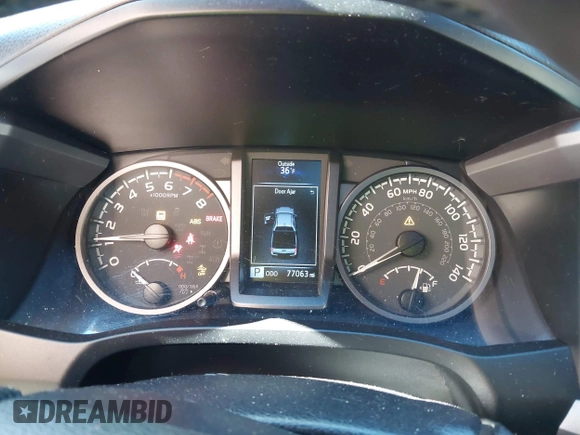 2021 Toyota Tacoma 4WD SR5 with VIN 3TMDZ5BN4MM117564, listed as a IAAI auction lot 41629220 with 77,063 mi miles. Bid and sale history available at carsss.com. Image 7.