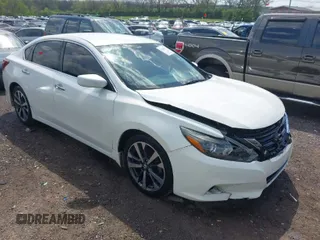 2017 Nissan Altima 2.5 SV with VIN 1N4AL3AP0HC130420, listed as a IAAI auction lot 42004521 with 144,378 mi miles. Bid and sale history available at carsss.com. Image 1.