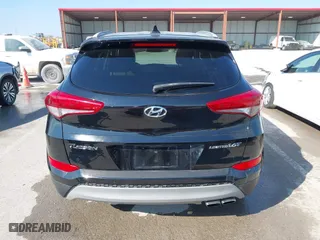2017 Hyundai Tucson Value with VIN KM8J33A25HU586191, listed as a IAAI auction lot 41682127 with 58,877 mi miles. Bid and sale history available at carsss.com. Image 16.