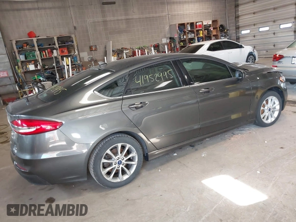 2020 Ford Fusion SE z VIN 3FA6P0LU4LR118809, wystawiony jako IAAI lot #41952995 z przebiegiem 35 353 mil mil oraz . Historia ofert i sprzedaży dostępna na DreamBid. Obrazek 4.