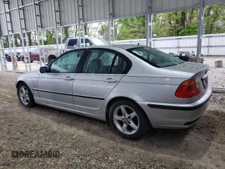 2000 BMW 3 Series 323i with VIN WBAAM3348YFP73443, listed as a Copart auction lot 54165575 with 334,761 mi miles and Salvage title. Bid and sale history available at DreamBid. Image 2.