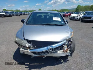 2009 Honda Civic DX-VP z VIN 2HGFA16399H349229, wystawiony jako IAAI lot #41749953 z przebiegiem 201 533 mil mil oraz . Historia ofert i sprzedaży dostępna na DreamBid. Obrazek 13.