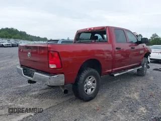 2014 Ram 2500 Tradesman z VIN 3C6UR5CL9EG187100, wystawiony jako IAAI lot #42373397 z przebiegiem 214 720 mil mil oraz . Historia ofert i sprzedaży dostępna na DreamBid. Obrazek 4.
