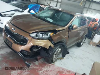 2018 Kia Sportage LX with VIN KNDPMCACXJ7446520, listed as a IAAI auction lot 41568985 with 79,601 mi miles and . Bid and sale history available at DreamBid. Image 2.