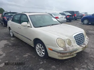 2005 Kia Amanti z VIN KNALD124555051766, wystawiony jako IAAI lot #42510775 z przebiegiem 168 484 mil mil oraz . Historia ofert i sprzedaży dostępna na DreamBid. Obrazek 1.