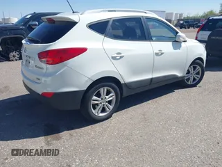 2011 Hyundai Tucson Limited with VIN KM8JUCAC0BU206509, listed as a IAAI auction lot 42034266 with 185,989 mi miles and . Bid and sale history available at DreamBid. Image 4.