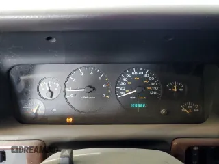 1998 Jeep Grand Cherokee Limited with VIN 1J4GZ78Y8WC285670, listed as a Copart auction lot 70213044 with 128,382 mi miles and Clean Title. Bid and sale history available at carsss.com. Image 9.