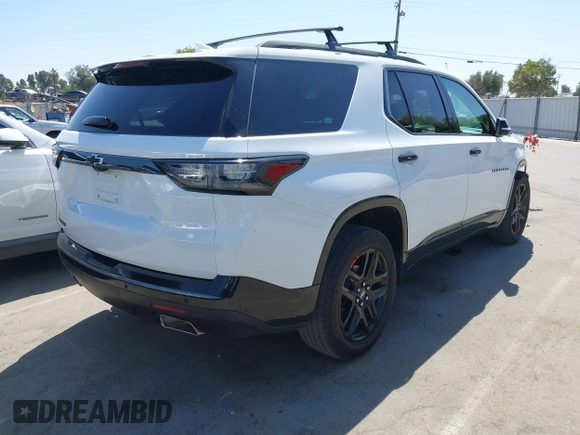2020 Chevrolet Traverse Premier with VIN 1GNERKKW0LJ242236, listed as a IAAI auction lot 42588362 with 78,058 mi miles and . Bid and sale history available at DreamBid. Image 4.