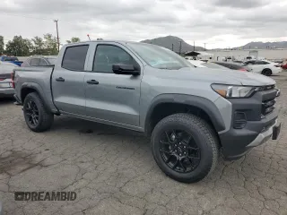 2024 Chevrolet Colorado 4WD Trail Boss with VIN 1GCPTEEK3R1253043, listed as a Copart auction lot 53705385 with 3,706 mi miles and Salvage title. Bid and sale history available at DreamBid. Image 4.