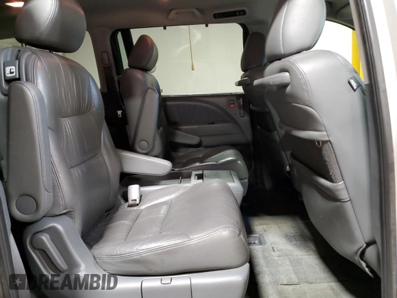 2007 Honda Odyssey Touring z VIN 5FNRL38887B102328, wystawiony jako Copart lot #52113595 z przebiegiem 105 394 mil mil oraz Szkoda całkowita • Salvage title. Historia ofert i sprzedaży dostępna na DreamBid. Obrazek 11.