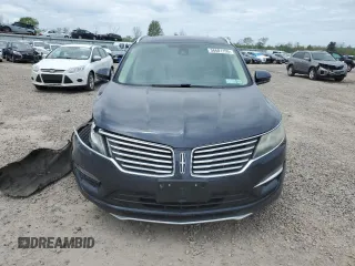 2015 Lincoln MKC z VIN 5LMTJ2AH9FUJ03616, wystawiony jako Copart lot #56681155 z przebiegiem 95 055 mil mil oraz Szkoda całkowita • Salvage title. Historia ofert i sprzedaży dostępna na DreamBid. Obrazek 5.