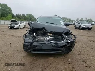 2022 Volkswagen Tiguan S z VIN 3VV0B7AX9NM058029, wystawiony jako Copart lot #57146035 z przebiegiem 40 070 mil mil oraz Szkoda całkowita • Salvage title. Historia ofert i sprzedaży dostępna na DreamBid. Obrazek 13.