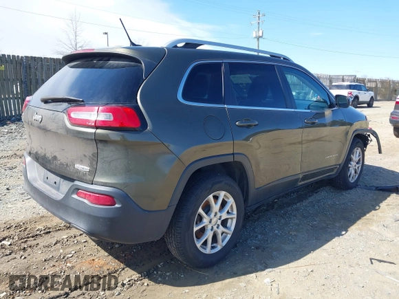 2014 Jeep Cherokee Latitude with VIN 1C4PJMCS5EW201462, listed as a IAAI auction lot 41727379 with 170,958 mi miles and . Bid and sale history available at DreamBid. Image 4.