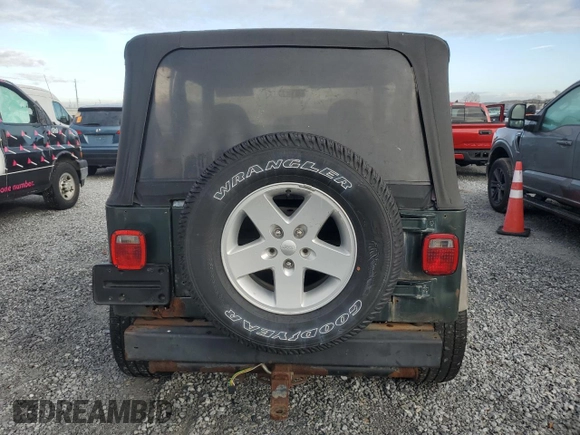 2002 Jeep Wrangler Sport with VIN 1J4FA49SX2P726553, listed as a Copart auction lot 42559245 with 198,584 mi miles and Clean Title. Bid and sale history available at carsss.com. Image 6.