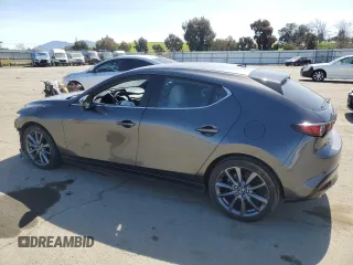 2019 Mazda 3 Preferred with VIN JM1BPBMM2K1133482, listed as a Copart auction lot 50001155 with 71,132 mi miles and Salvage title. Bid and sale history available at DreamBid. Image 2.