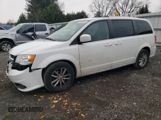 2018 Dodge Grand Caravan SXT z VIN 2C4RDGCG9JR133702, wystawiony jako Copart lot #85824554 z przebiegiem 140 881 mil mil oraz Szkoda całkowita • Salvage title. Historia ofert i sprzedaży dostępna na DreamBid. Obrazek 1.