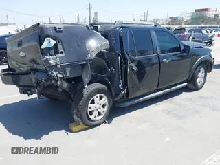 2007 Ford Explorer Sport Trac XLT z VIN 1FMEU31K17UA01300, wystawiony jako IAAI lot #42321378 z przebiegiem 221 813 mil mil oraz . Historia ofert i sprzedaży dostępna na DreamBid. Obrazek 4.
